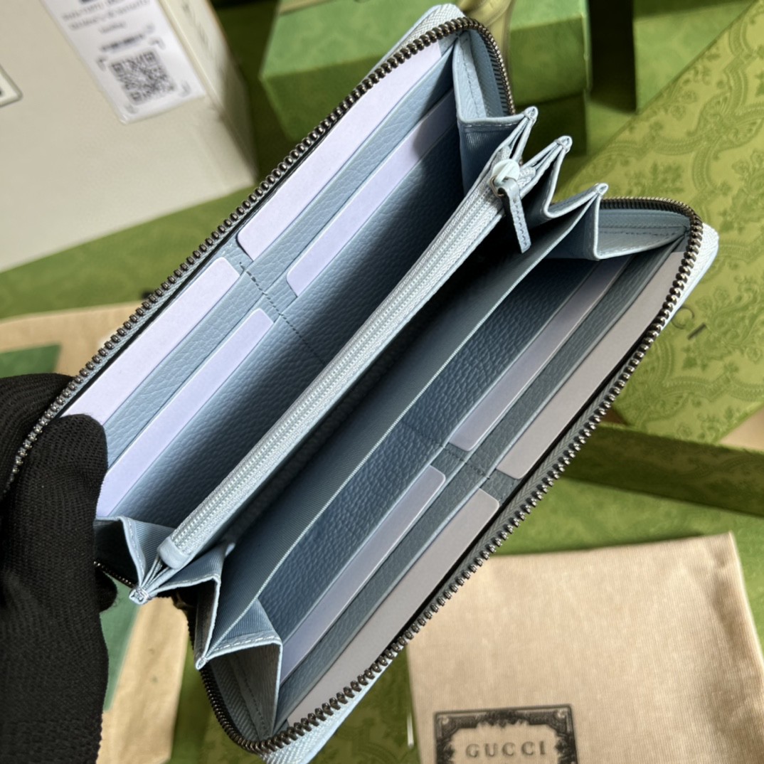 G*u*i leather zip around wallet