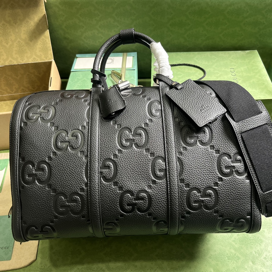 G*u*i gg duffle bag