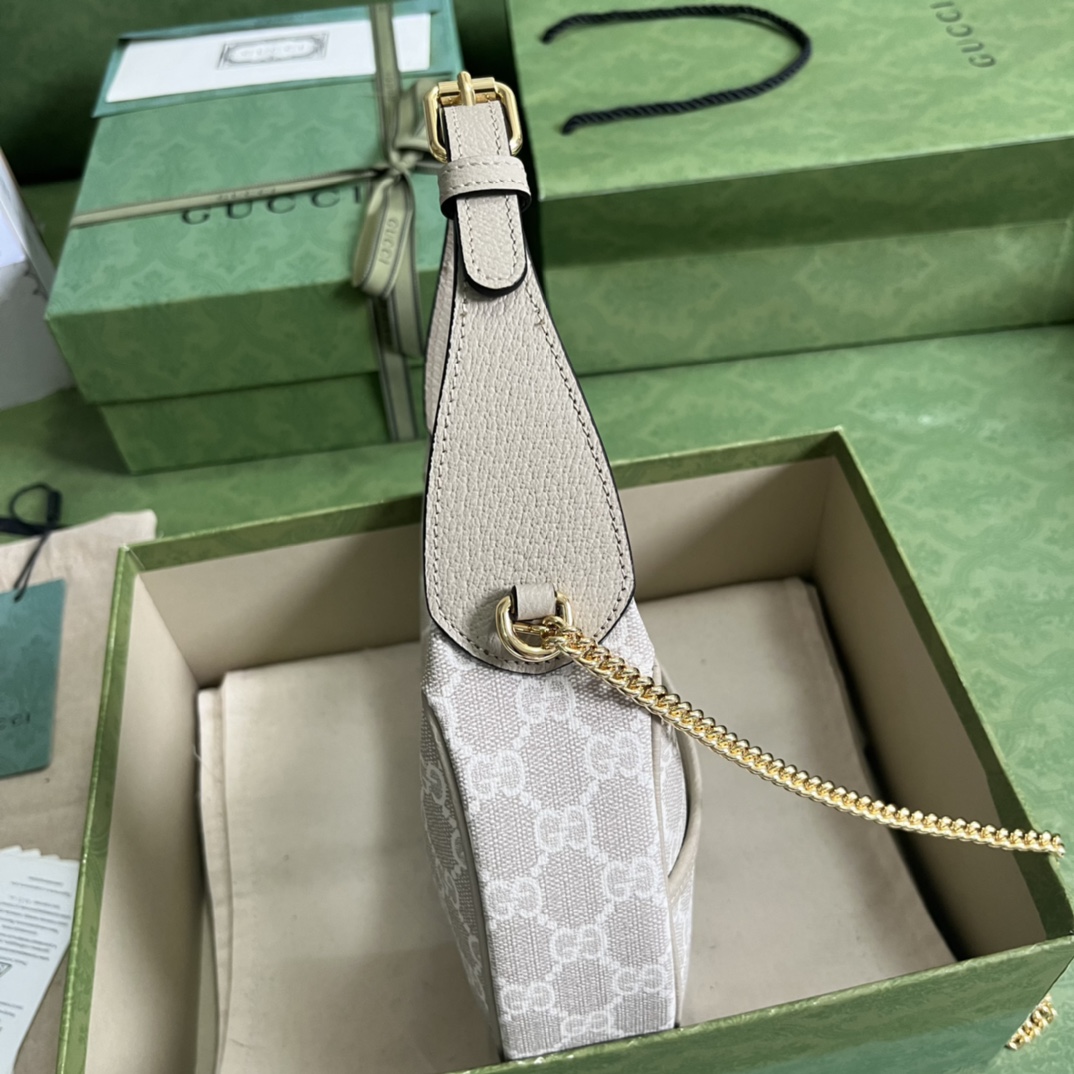 G*u*i half-moon-shaped mini bag with interlocking g