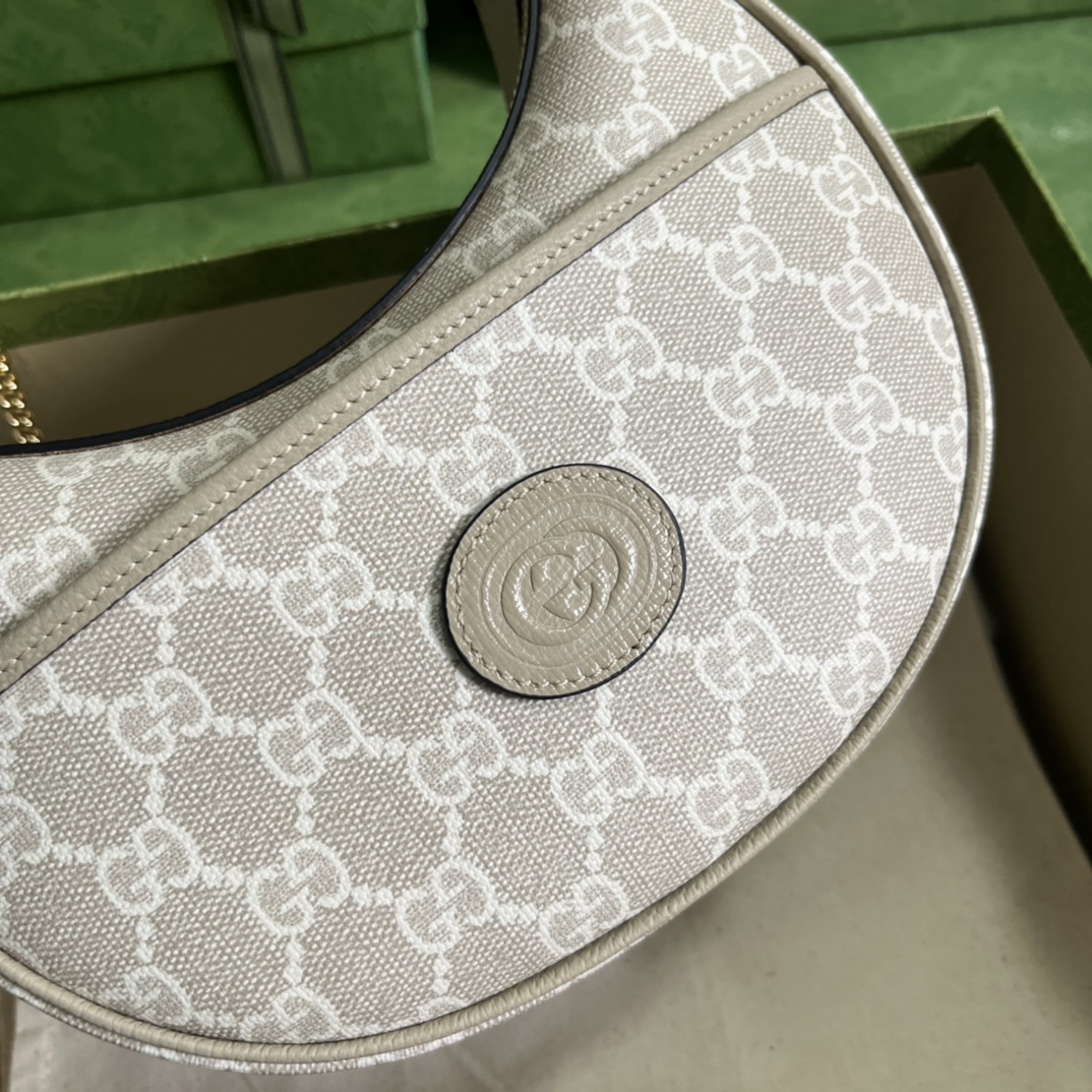 G*u*i half-moon-shaped mini bag with interlocking g