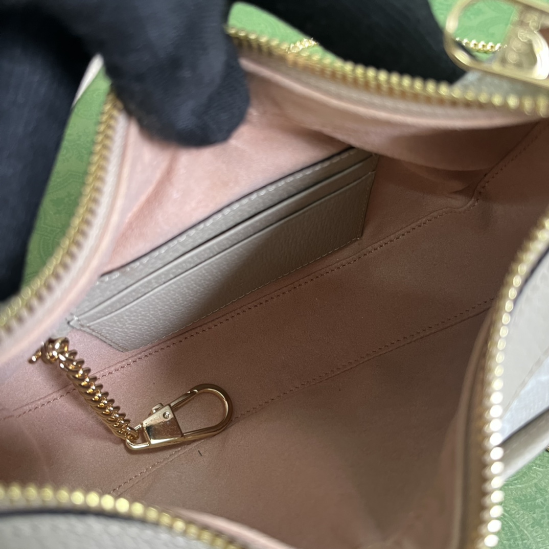 G*u*i half-moon-shaped mini bag with interlocking g