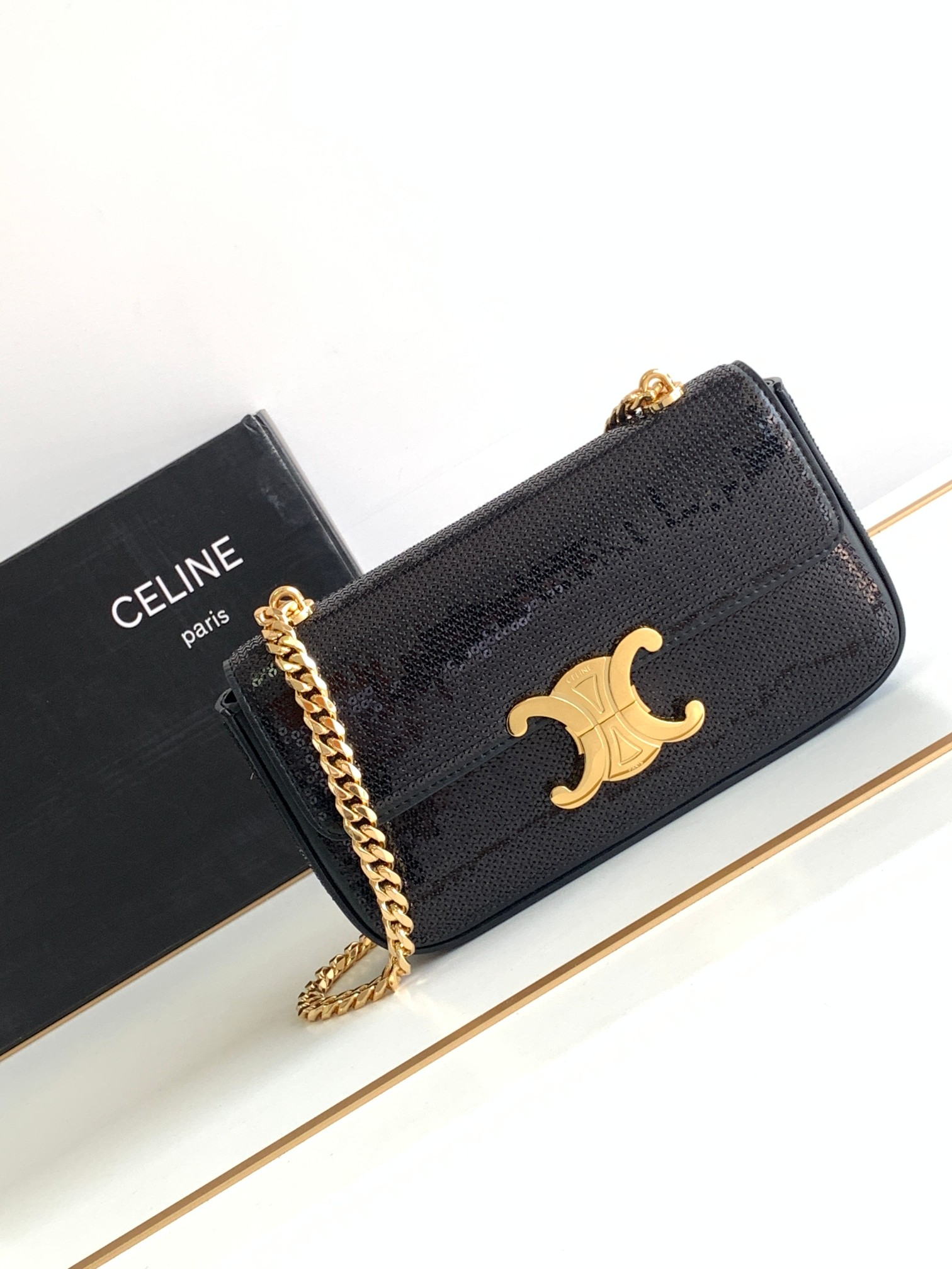 Ce**e chain shoulder bag triomphe