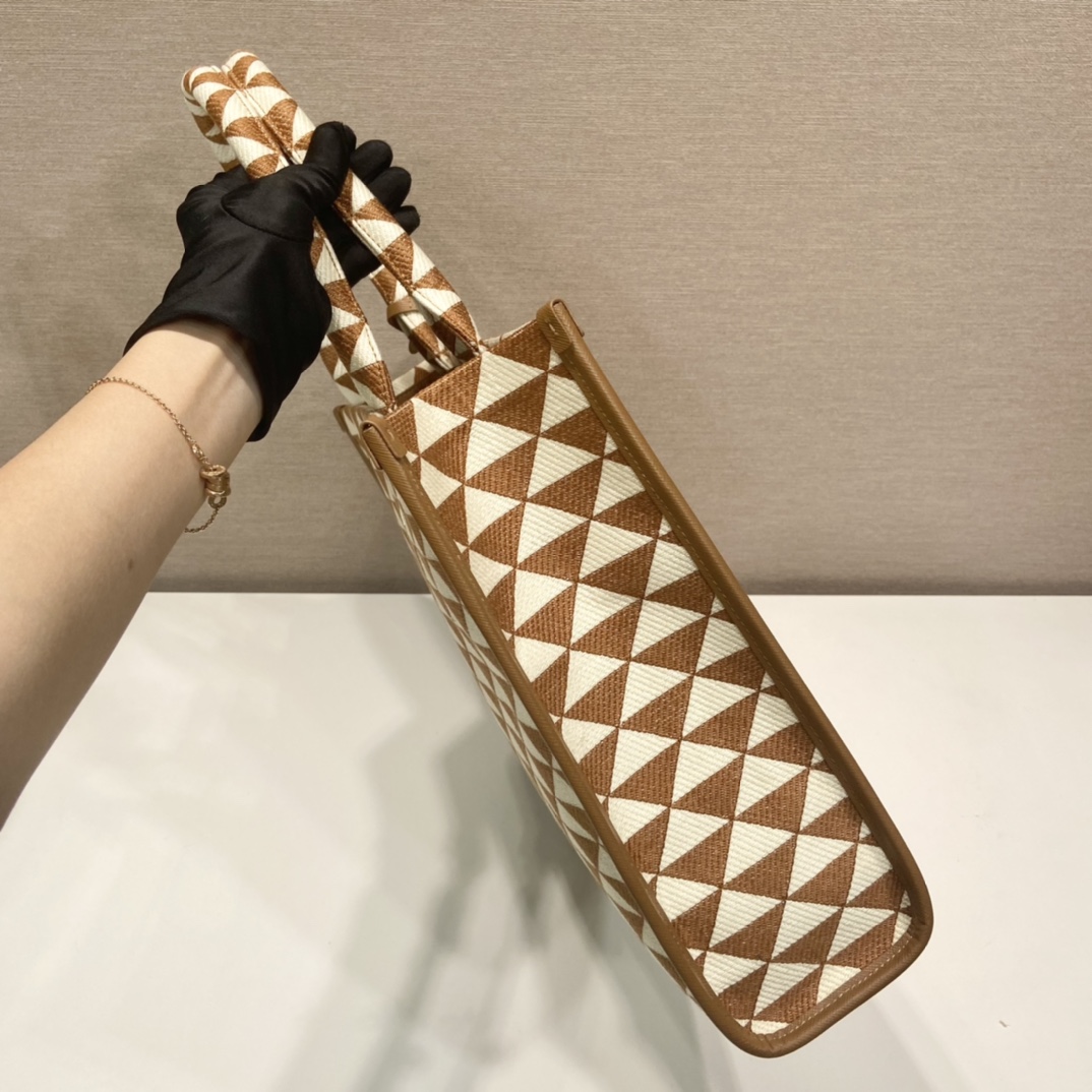 large Pra*a symbole embroidered fabric handbag