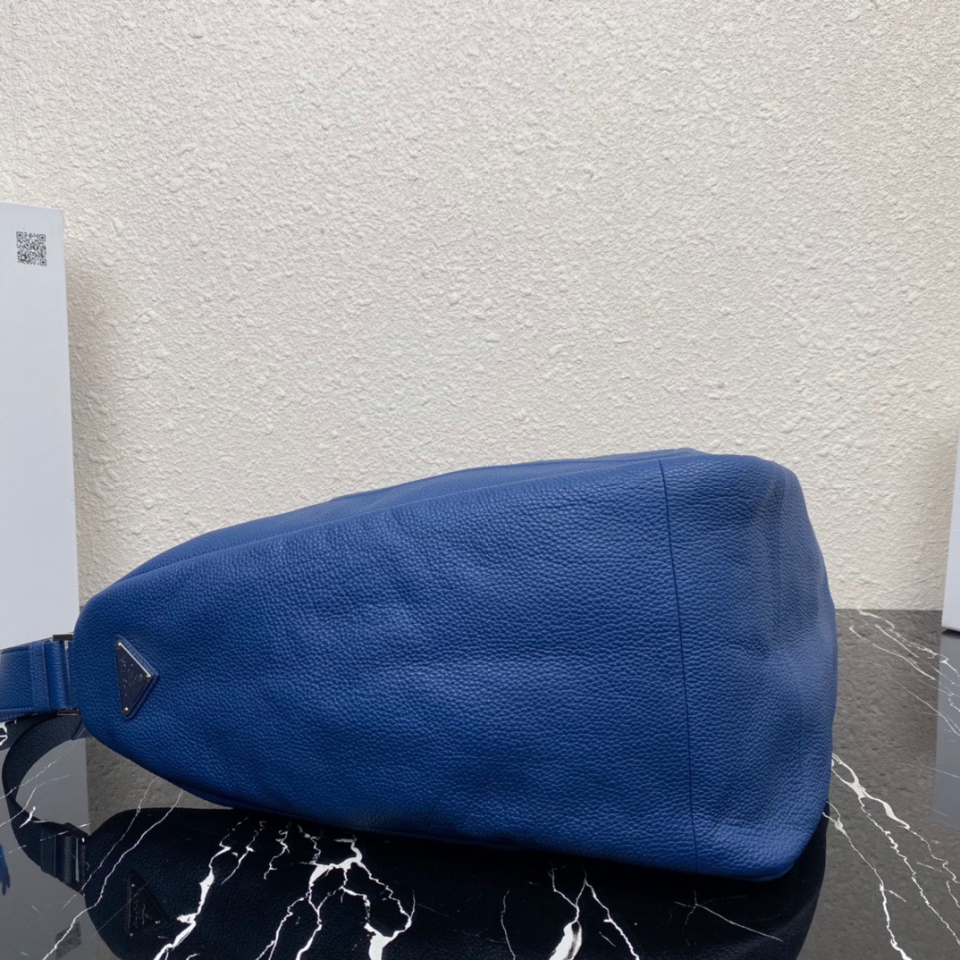 large leather Pra*a triangle bag