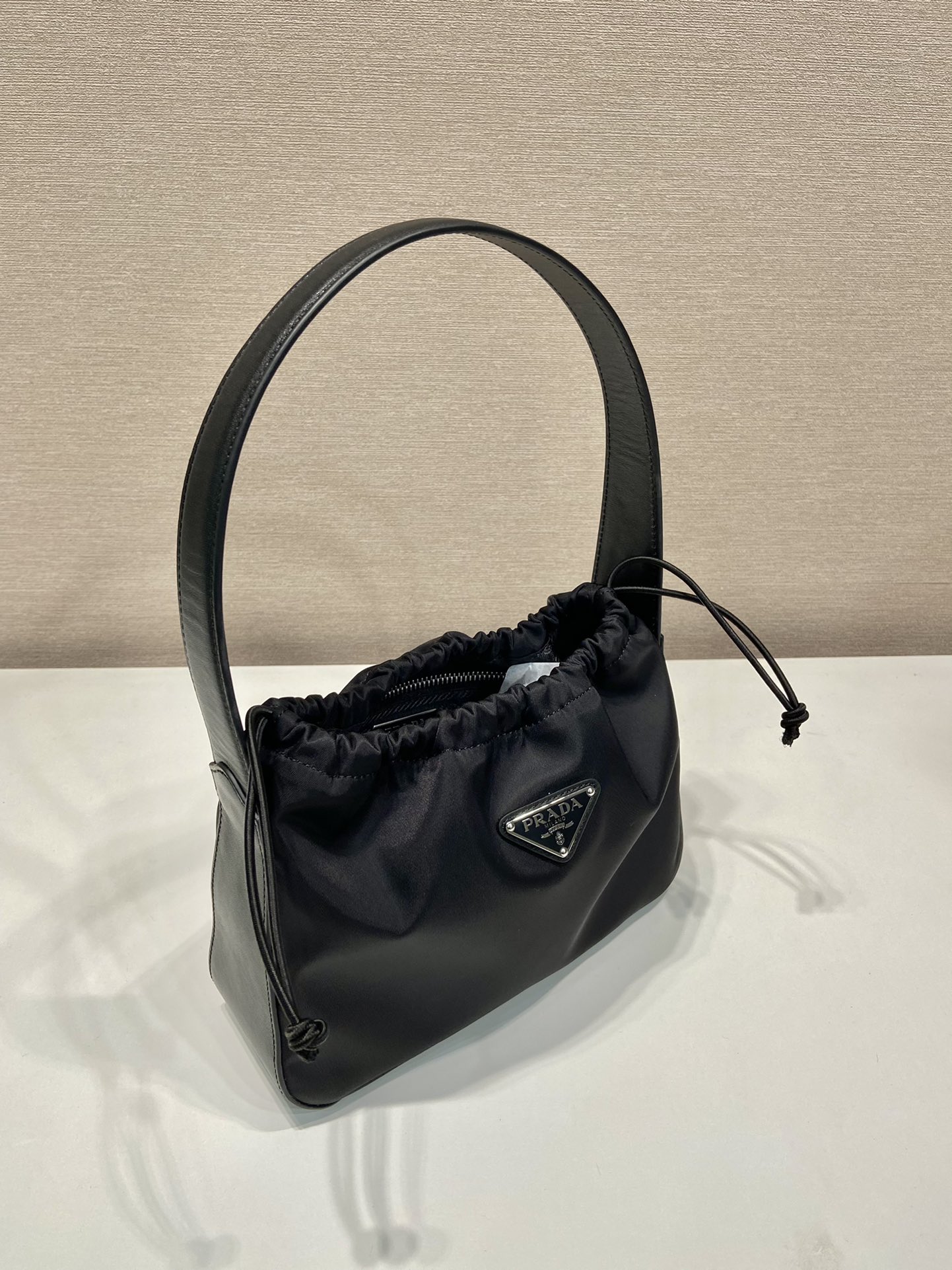 Pra*a small hobo bag